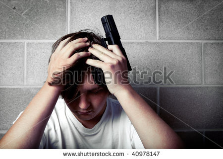 stock-photo-teen-depression-teenager-with-hands-on-head-holding-handgun-40978147.jpg